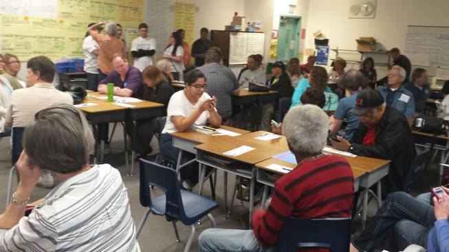Democratic caucusgoers gather in a classroom at Lorna J. Kesterson Elementary School on Saturday, Feb. 20, 2016.