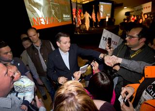 Republican presidential candidate Sen. Ted Cruz (Texas) thanks supporters during a caucus watch party at the Bill & Lillie Heinrich YMCA on Meadows Lane Tuesday, Feb. 23, 2016.