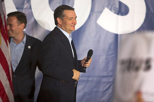 Republican presidential candidate Sen. Ted Cruz (Texas) arrives onstage during a caucus watch party at the Bill & Lillie Heinrich YMCA on Meadows Lane Tuesday, Feb. 23, 2016. Nevada Attorney General Adam Laxalt is at left.