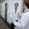 Michael Mondheim, left, a third-year medical student at Touro University, consults with Dr. David Renton after examining a patient at the Touro Health Center Tuesday, Jan. 26, 2016.