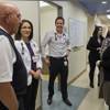 Volunteers in Medicine Medical Director Rebecca Edgeworth (right) gives a tour to a retired doctor in their clinic on Friday, Jan. 22, 2016.