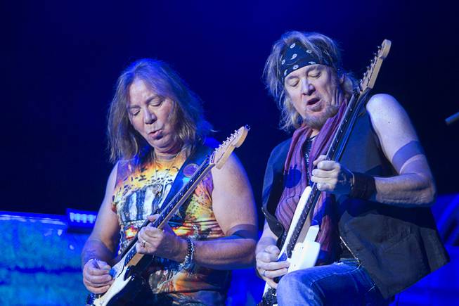 Iron Maiden guitarists Dave Murray and Adrian Smith perform Sunday, Feb. 28, 2016, at Mandalay Bay Events Center.