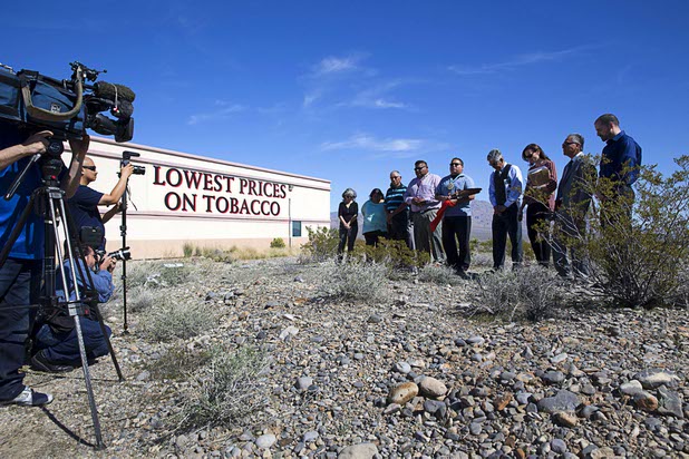 Members of the Las Vegas Paiute tribe and representatives of Ultra Health participate in a blessing ceremony on the site of a future medical marijuana cultivation/production facility on the Snow Mountain Indian reservation Monday, Feb. 29, 2016.
