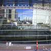 New York-New York and the Monte Carlo are reflected in the exterior glass of the T-Mobile Arena Tuesday, March 1, 2016. 