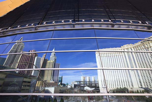 New York-New York and Monte Carlo are reflected in the exterior glass of T-Mobile Arena on March 1, 2016. MGM Resorts International is in the midst of its “reimagining” of Monte Carlo into Park MGM and NoMad.
