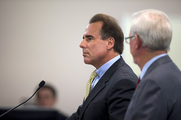 Mark Frissora, center, president and CEO of Caesars Entertainment, listens to a question during a Nevada Gaming Control Board meeting Wednesday, March 2, 2016, at Grant Sawyer State Building. Attorney Frank Schreck is at right.