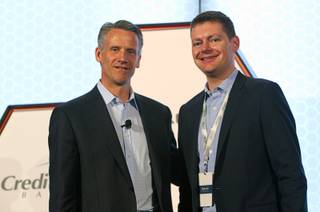 Steve Phelps, left, NASCAR executive vice president and chief marketing officer, and Brian Davis, vice president of marketing for Allegiant Air, pose during a Las Vegas NASCAR Fuel for Business Council meeting at the Cosmopolitan Thursday, March 3, 2016. At the meeting, Phelps and Davis announced that Las Vegas-based Allegiant Air will be the official passenger airline of NASCAR.