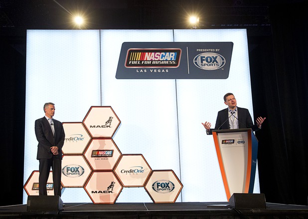 Steve Phelps, left, NASCAR executive vice president and chief marketing officer, listens to Brian Davis, vice president of marketing for Allegiant Air, during a Las Vegas NASCAR Fuel for Business Council meeting at the Cosmopolitan Thursday, March 3, 2016. At the meeting, Phelps and Davis announced that Las Vegas-based Allegiant Air will be the official passenger airline of NASCAR.