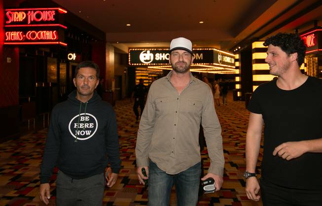 Actor Gerard Butler, center, and friends at Planet Hollywood on ...