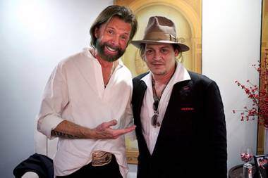 Ronnie Dunn and Johnny Depp backstage at the Colosseum on Friday, Dec. 11, 2015, in Caesars Palace.