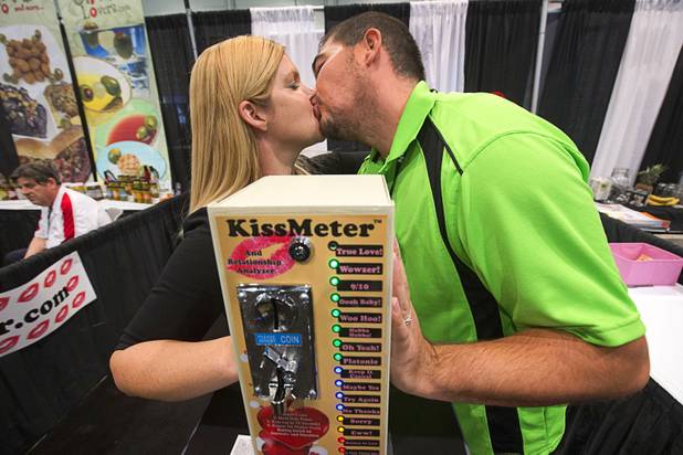 Shannon and Martin Corbett hit the "Wowzer level on the KissMeter during the 2016 Nightclub & Bar convention at the Las Vegas Convention Center Tuesday, March 8, 2016. The KissMeter is a coin-operated amusement game that evaluates kissing skills based on the intensity and duration of their kiss.