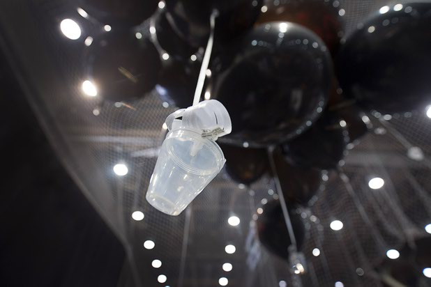 A Clip On Shots container hangs from a helium-filled ballon during the 2016 Nightclub & Bar convention at the Las Vegas Convention Center Tuesday, March 8, 2016.