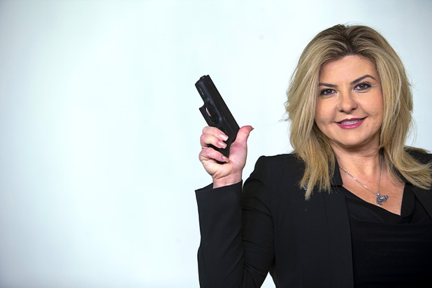 Las Vegas Assemblywoman Michele Fiore poses with her Glock in the Las Vegas Sun studio before an interview Wednesday, Feb. 24, 2016.