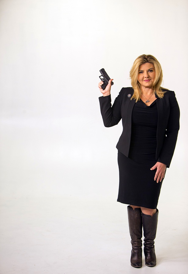 Assemblywoman Michele Fiore (District 4-Las Vegas) poses with her Glock G43 in the Las Vegas Sun studio before an interview Wednesday, Feb. 24, 2016.