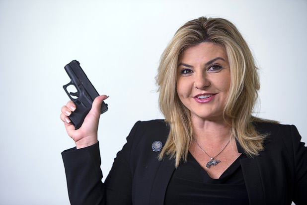 Assemblywoman Michele Fiore (District 4-Las Vegas) poses with her Glock G43 in the Las Vegas Sun studio before an interview Wednesday, Feb. 24, 2016.