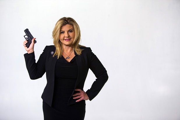 Assemblywoman Michele Fiore (District 4-Las Vegas) poses with her Glock G43 in the Las Vegas Sun studio before an interview Wednesday, Feb. 24, 2016.
