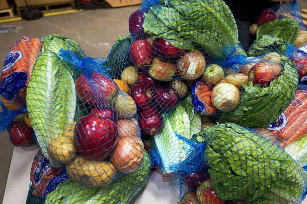 Bagged produce for the Senior Share program is displayed at Three Squares north campus, 4220 N. Pecos Rd., Wednesday, March 16, 2016.