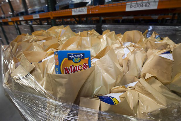 Meals for mobile food pantries are shown at Three Squares north campus, 4220 N. Pecos Rd., Wednesday, March 16, 2016.