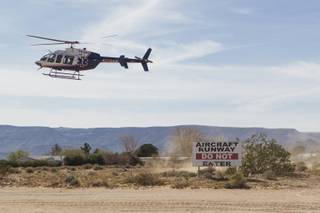 A helicopter prepares to land at Kidwell Airport in Cal-Nev-Ari, Nev. on March 2, 2016.
