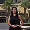 Tyra Bell-Holland is the owner of RESORTcierge MD, a medical company that treats customers (primarily tourists) who are staying at resorts/hotels. Bell-Holland stands outside of The District with Green Valley Ranch Resort & Spa  Casino, one of the many places she serves.