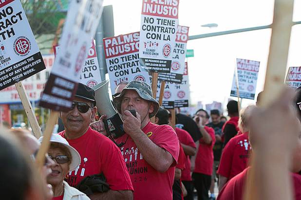 Supporters of Culinary Local 226 gather in front of the Palms to rally for unionization efforts there, Friday, March 18, 2016.