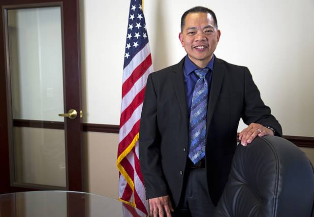 Sonny Vinuya, president of the Asian Chamber of Commerce, poses in a conference room at Nevada State Bank Tuesday, March 22, 2016. Vinuya is also a vice president/ small business relationship manager at the bank.