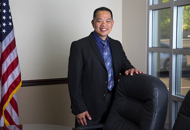 Sonny Vinuya, president of the Asian Chamber of Commerce, poses in a conference room at Nevada State Bank Tuesday, March 22, 2016. Vinuya is also a vice president/ small business relationship manager at the bank.