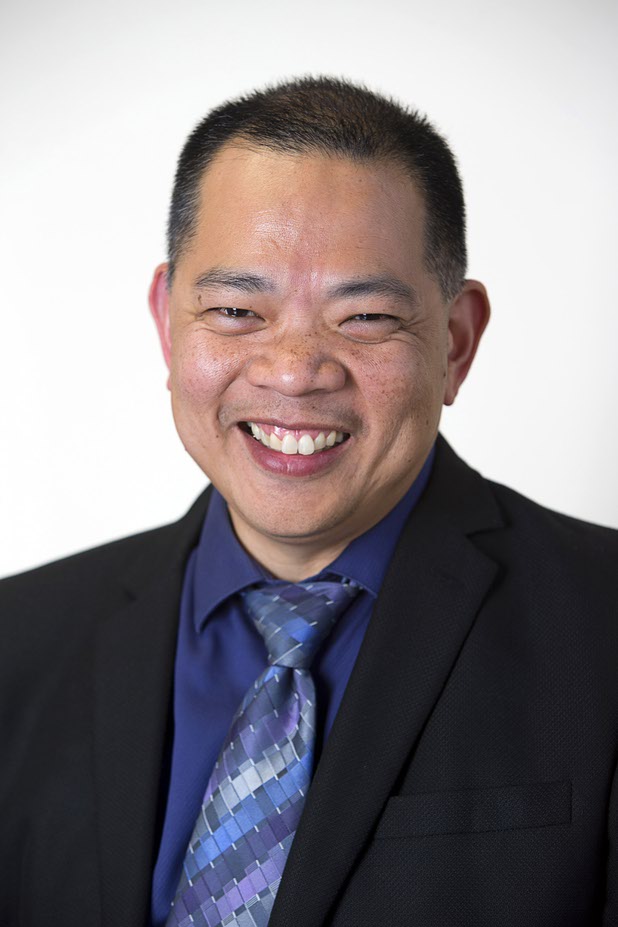 Sonny Vinuya, president of the Asian Chamber of Commerce, poses in a conference room at Nevada State Bank Tuesday, March 22, 2016. Vinuya is also a vice president/ small business relationship manager at the bank.