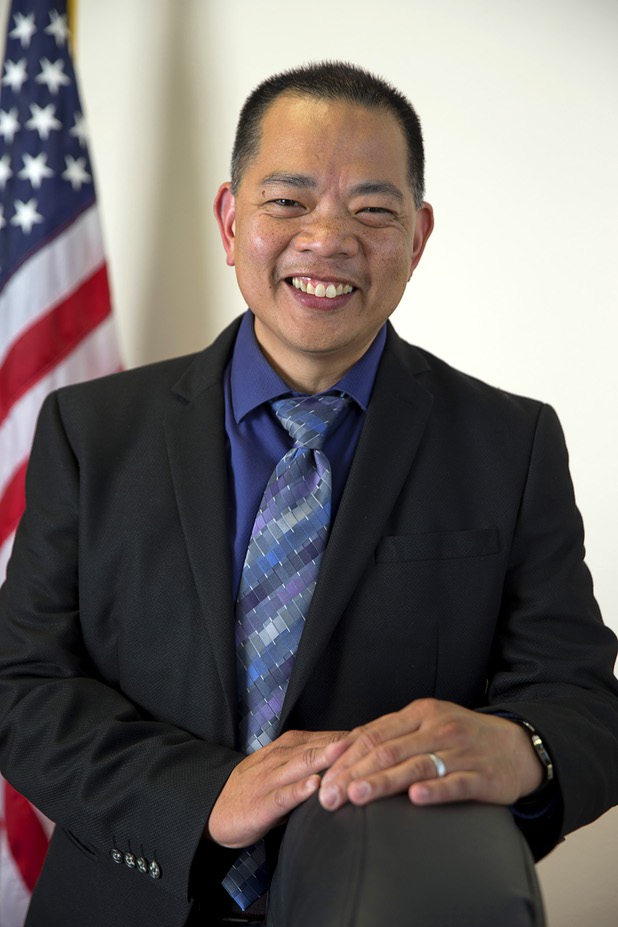 Sonny Vinuya, president of the Asian Chamber of Commerce, poses in a conference room at Nevada State Bank Tuesday, March 22, 2016. Vinuya is also a vice president/ small business relationship manager at the bank.