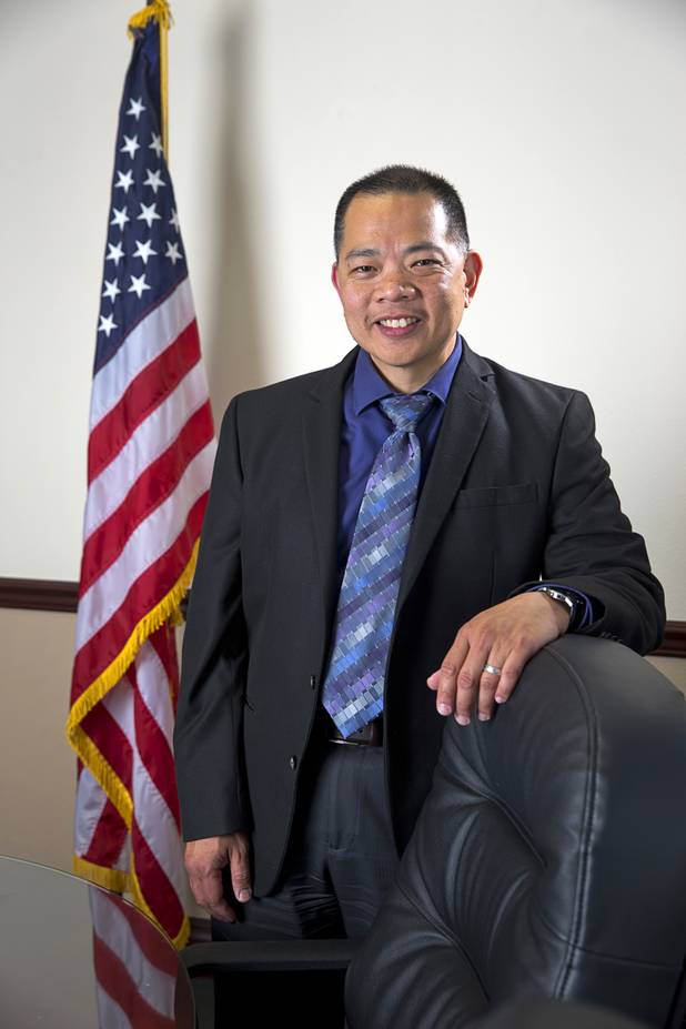 Sonny Vinuya, president of the Asian Chamber of Commerce, poses in a conference room at Nevada State Bank Tuesday, March 22, 2016. Vinuya is also a vice president/ small business relationship manager at the bank.