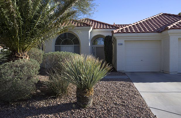 An exterior view of a home where accused squatter Bayzle Morgan lived at 7709 Wedlock Lane, Tuesday, March 22, 2016.