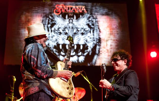 Carlos Santana, left, performs at House of Blues on Monday, March 21, 2016, in Mandalay Bay.
