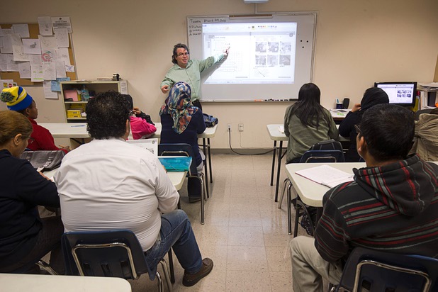 English as a Second Language teacher Robbie Fink teaches a beginning class at Catholic Charities of Southern Nevada Tuesday, March 29, 2016. Many of the students are refugees.