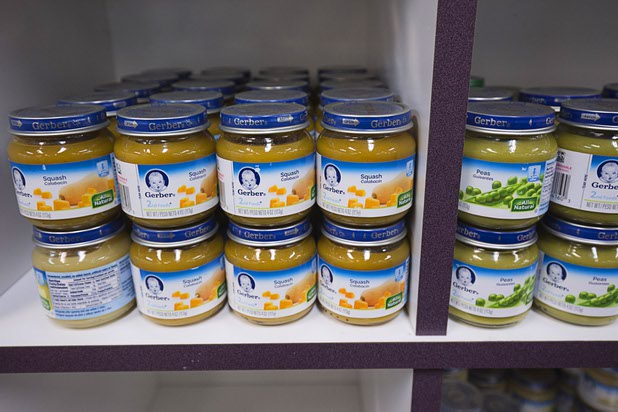 Baby food is shown in the Hands of Hope Community Food Pantry at Catholic Charities of Southern Nevada Tuesday, March 29, 2016. About 4000 families visit the pantry every month, said spokeswoman Leslie Carmine.