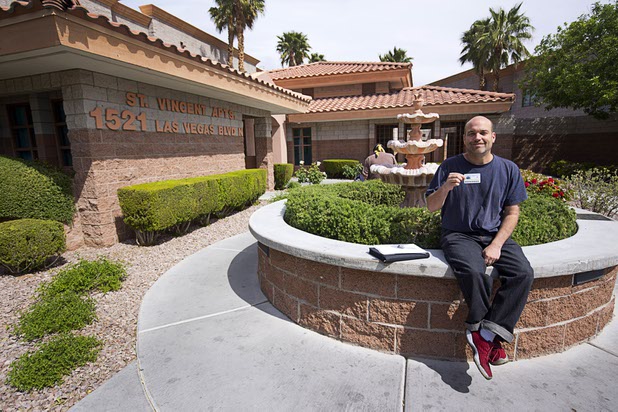 Resident Richard M. White III poses outside the St. Vincent Apartments during a tour of Catholic Charities of Southern Nevada Tuesday, March 29, 2016. The apartments provide 120 units of transitional housing for men and women.