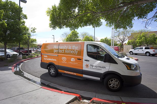 A Dignity Health van is shown during a tour of Catholic Charities of Southern Nevada Tuesday, March 29, 2016. Donated by St. Rose Dominican Hospitals, the Dignity Health program provides the van to assist clients in reaching medical services and a case manager to coordinate the transportation.