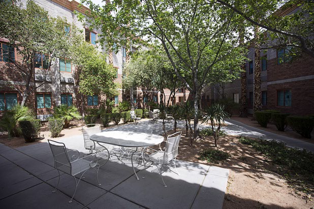 A courtyard is shown at the St. Vincent Apartments at Catholic Charities of Southern Nevada Tuesday, March 29, 2016. The apartments provide 120 units of transitional housing for men and women.