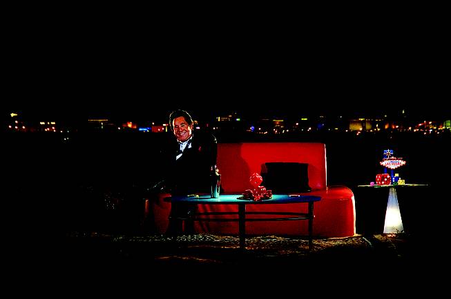 A promotional shot shows Wayne Newton on a couch as part of his “Up Close and Personal” residency at Windows Showroom at Bally’s.