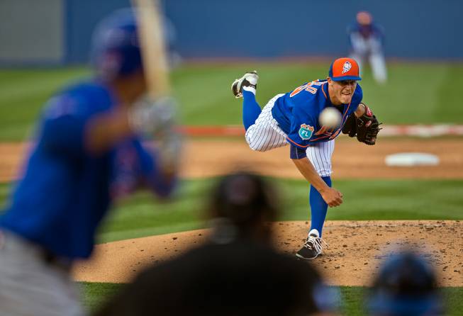 New York Mets' pitcher Paul Sewald (79) sends a ball towards the plate versus the Chicago Cubs during a Big League Weekend baseball game at Cashman Field on Thursday, March 31, 2016.