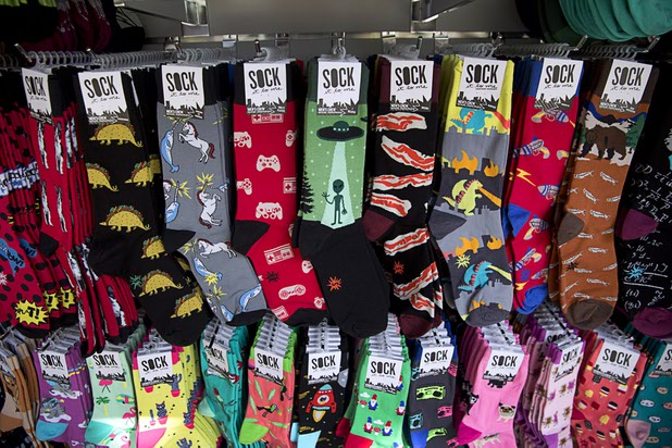 Sock It To Me socks are shown at a vendor's kiosk during the grand opening of The Park Monday, April 4, 2016. The new pocket park, lined with restaurants and seating for outdoor dining, runs from the Las Vegas Strip to the new T-Mobile Arena.