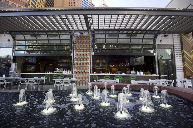 A water feature is shown in front of the California Pizza Kitchen during the grand opening of The Park Monday, April 4, 2016. The new pocket park, lined with restaurants and seating for outdoor dining, runs from the Las Vegas Strip to the new T-Mobile Arena.