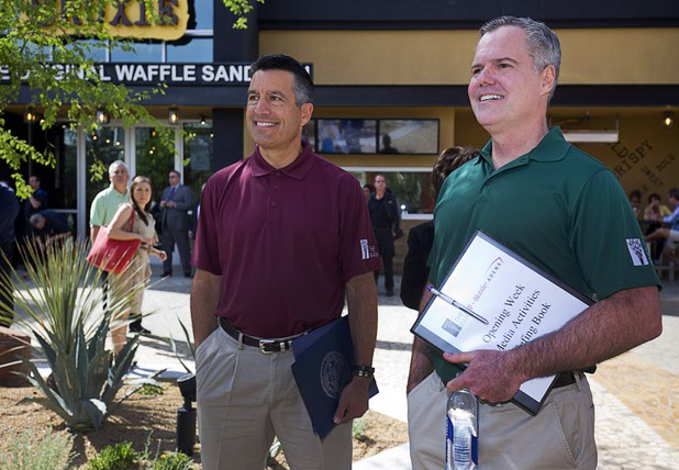 Nevada Governor Brian Sandoval, left, and MGM Resorts International Chairman/CEO Jim Murren arrive for the grand opening of The Park Monday, April 4, 2016. The new pocket park, lined with restaurants and seating for outdoor dining, runs from the Las Vegas Strip to the new T-Mobile Arena.
