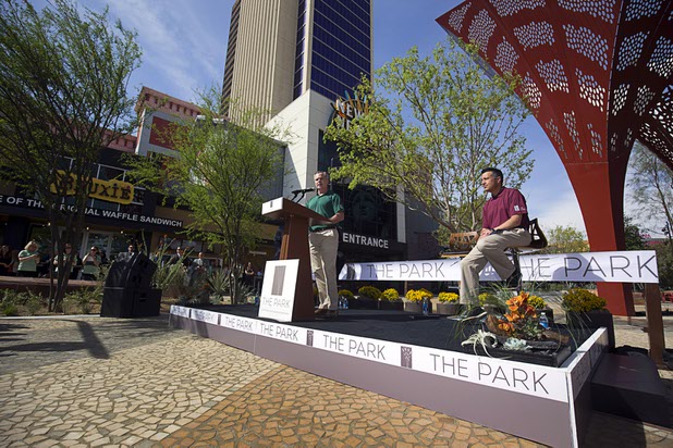 MGM Resorts International Chairman and CEO Jim Murren speaks during the grand opening of The Park on Monday, April 4, 2016. Gov. Brian Sandoval is seated at right.