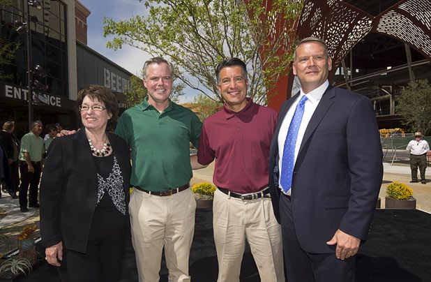 From left to right, Clark County Commissioner Mary Beth Scow, MGM Resorts International Chairman/CEO Jim Murren, Nevada Governor Brian Sandoval and Southern Nevada Water Authority General Manager John Entsminger, pose during the grand opening of The Park Monday, April 4, 2016.  The new pocket park, lined with restaurants and seating for outdoor dining, runs from the Las Vegas Strip to the new T-Mobile Arena.