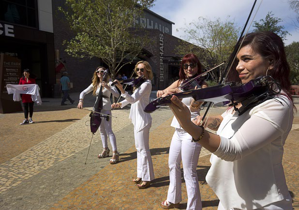 Musicians perform during the grand opening of The Park Monday, April 4, 2016. The new pocket park, lined with restaurants and seating for outdoor dining, runs from the Las Vegas Strip to the new T-Mobile Arena.