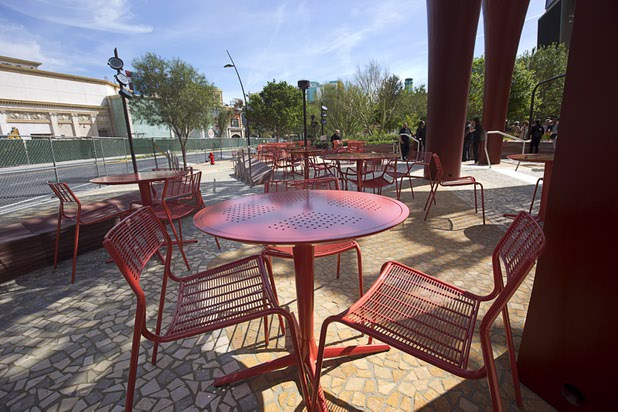 An outdoor seating area is shown during the grand opening of The Park Monday, April 4, 2016. The new pocket park, lined with restaurants and seating for outdoor dining, runs from the Las Vegas Strip to the new T-Mobile Arena.