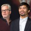 Trainer Freddie Roach and Manny Pacquiao of the Philippines pose during a final news conference at the MGM Grand Wednesday, April 6, 2016. Pacquiao and Timothy Bradley Jr. will meet for a third fight at the MGM Grand Garden Arena on Saturday.
