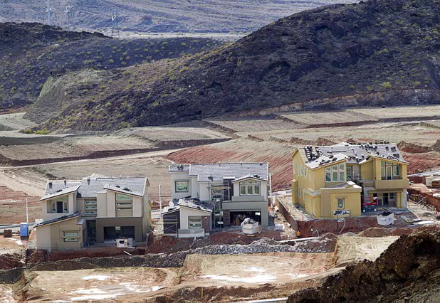 New homes are shown under construction at Lake Las Vegas on Sunday, April 10, 2016, in Henderson.