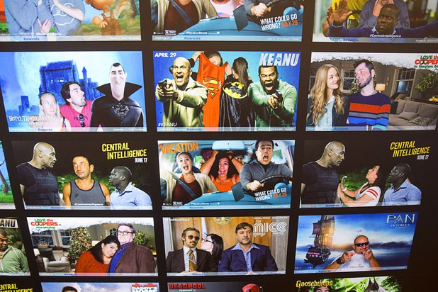 Sample photos are shown on a SelfieW.me photo booth during CinemaCon at Caesars Palace Tuesday, April 12, 2016. The booth puts your photo into a movie scene. CinemaCon is a convention for movie theater owners.