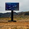 A Faraday Future sign, shown Wednesday, April 13, 2016, promotes the development of a $1 billion assembly plant at the Apex Industrial Park in North Las Vegas.
